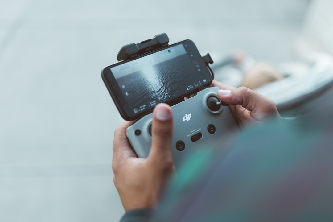 person-holding-red-and-black-nintendo-switch-efroxgk-z7u